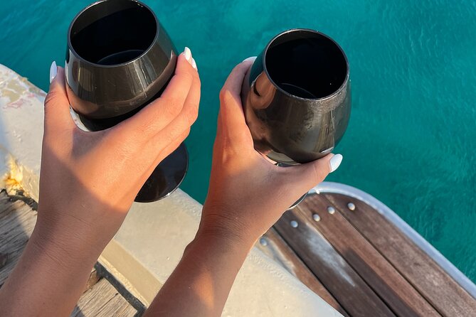 6 Hour Private Cruise in Mykonos with Food and Drinks - Getting on Board: Captain Grigoris and a Clean, Comfortable Boat