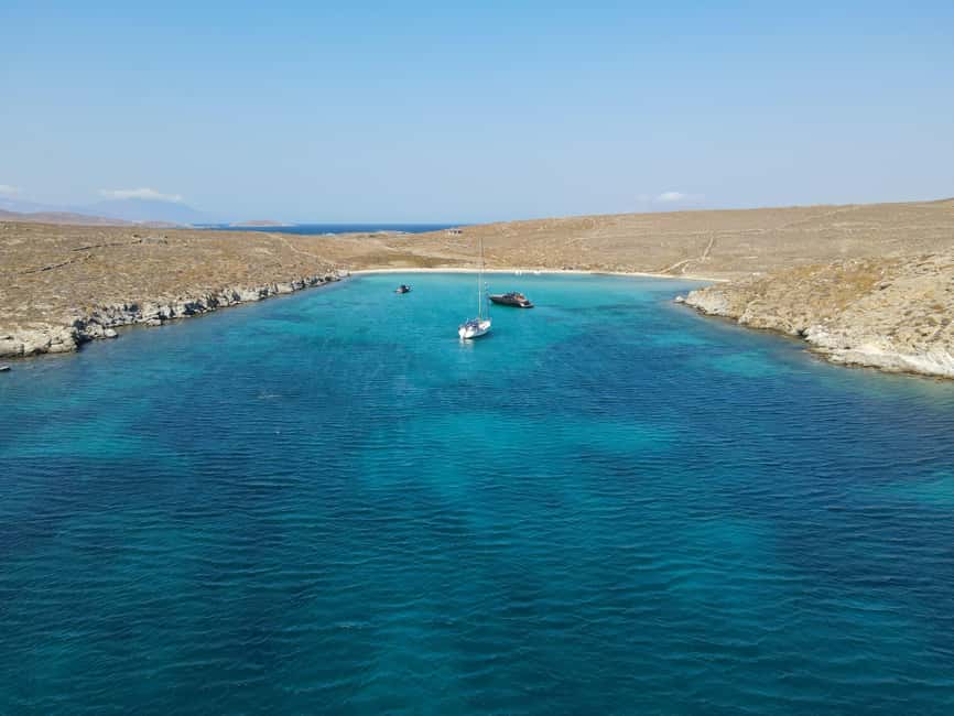 From Mykonos: Cruise to Delos and Rhenia with Lunch - The BBQ lunch on board: wine, skewers, tzatziki, repeat value