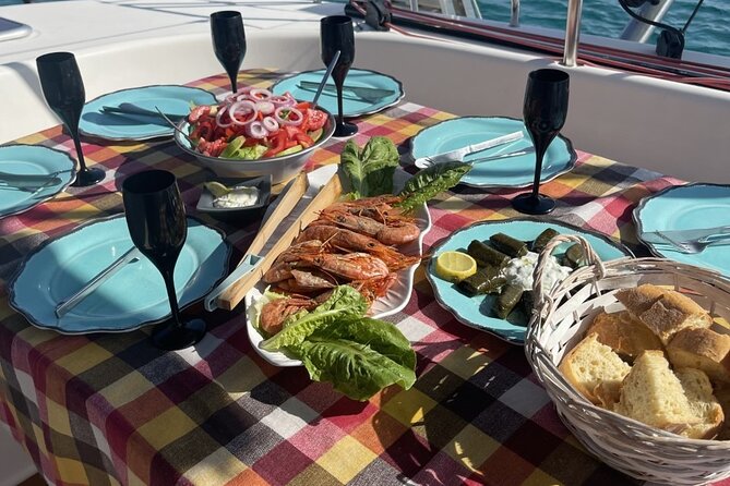 Luxury Catamaran Semi private cruise with meals & drinks and transportation. - Rhenia swim stop: snorkel time and a proper lunch on deck