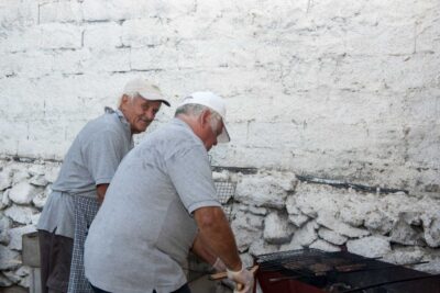 Mykonos: Barbecue at a Mykonian Farm - Arriving at the organic farm: raki, treats, and stone-couch comfort