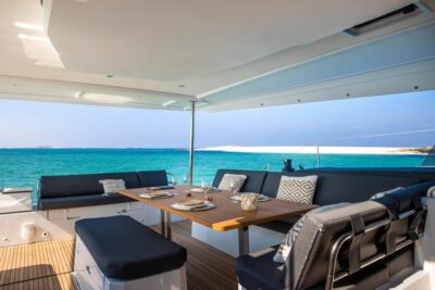 Mykonos: Catamaran Cruise with 3-Course Meal and Transfers - Pickup, van ride, and a safety briefing that actually helps