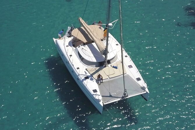 Mykonos Catamaran Private Day Cruise, Full Lunch & Open-bar - The sailing rhythm: safety briefing, smooth sailing, and swim time