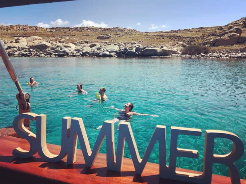 Mykonos: Delos and Rhenia Islands Cruise with BBQ Meal - Delos: UNESCO Ruins, the Right Amount of Time, and a Guided-Option Catch