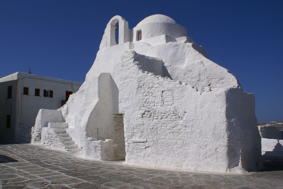 Mykonos: Half-Day City Walking Tour and Island Bus Tour - Ano Mera: a traditional square and a pause that feels like a reset