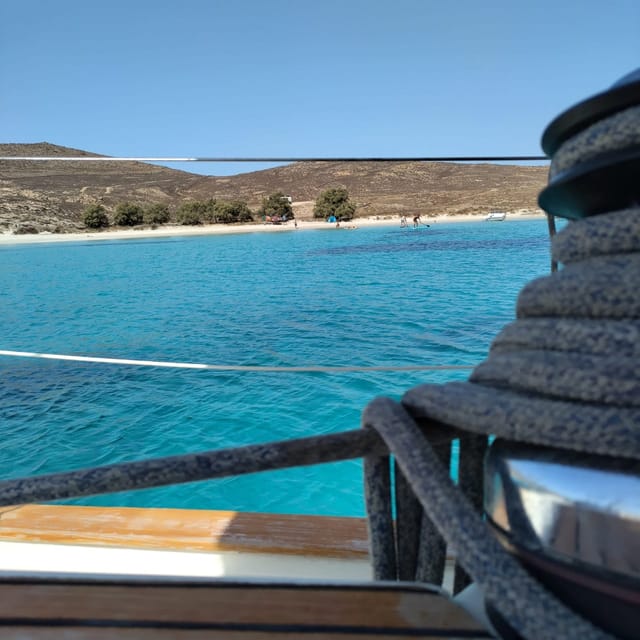 Mykonos: Rhenia Island Sunset Cruise with Transfer and Meal - Crew and Guides: What the Doukas Sailing Team Brings to the Ride
