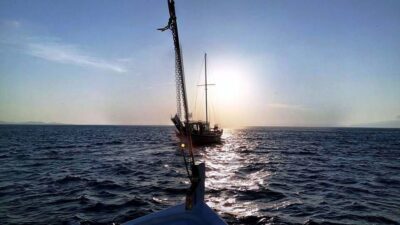 Mykonos: Sunset Boat Trip with Snacks and Drinks - Traditional wooden boat comfort and what’s really included