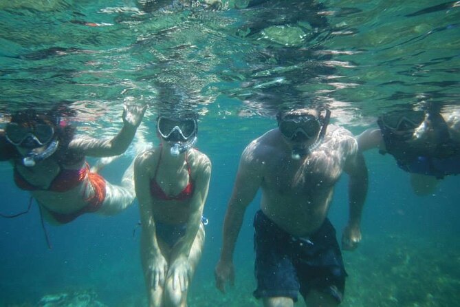 Private Active Island Tour by Minibus - Why Panormos Bay snorkeling feels different than typical Mykonos swims