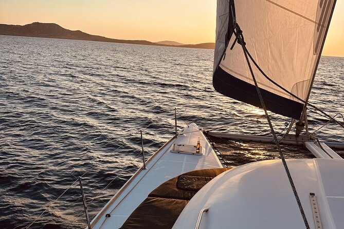 Private Mykonos Catamaran Day Cruise with Meals & Water Toys - Delos Stop: Ruins Time vs. More Water Time